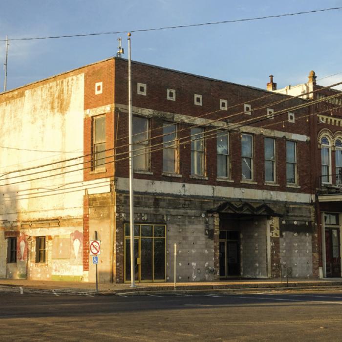 Pictured above is the current state of Schulenburg’s City Hall building in downtown. Below is a slide from the City’s design firm, PGAL, showing a rendering of what the exterior could look like if the renovation project proceeds.