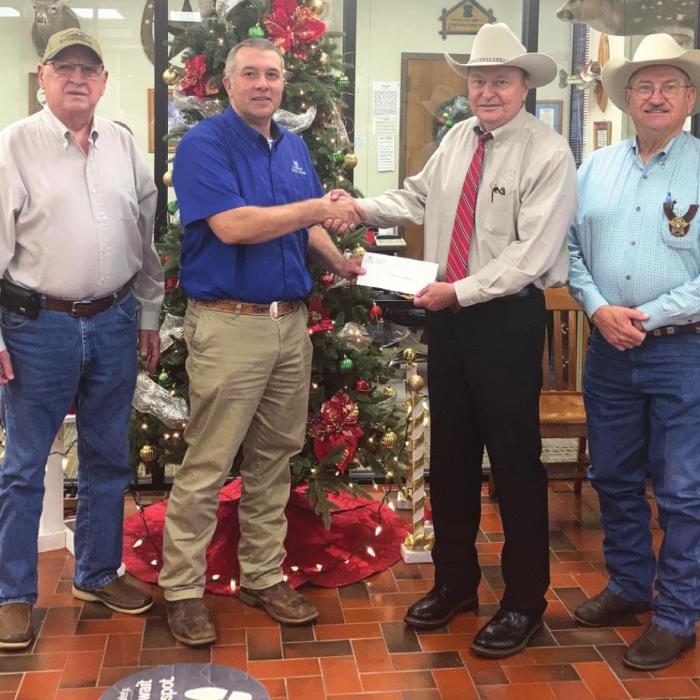 Pictured from left is Fayette County Crime Stoppers 2nd Vice President Joe Cernosek, Carmine State Bank President Chris Coufal, Fayette County Crime Stoppers President Dan Mueller, Secretary Randy Noviskie.