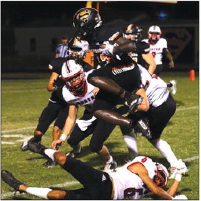 Janecek Runs for 4 TDs to Lead Shorthorns to Streak-Snapping Win