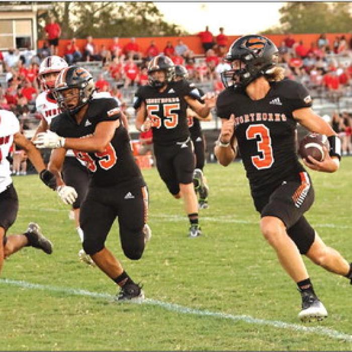 Janecek Runs for 4 TDs to Lead Shorthorns to Streak-Snapping Win