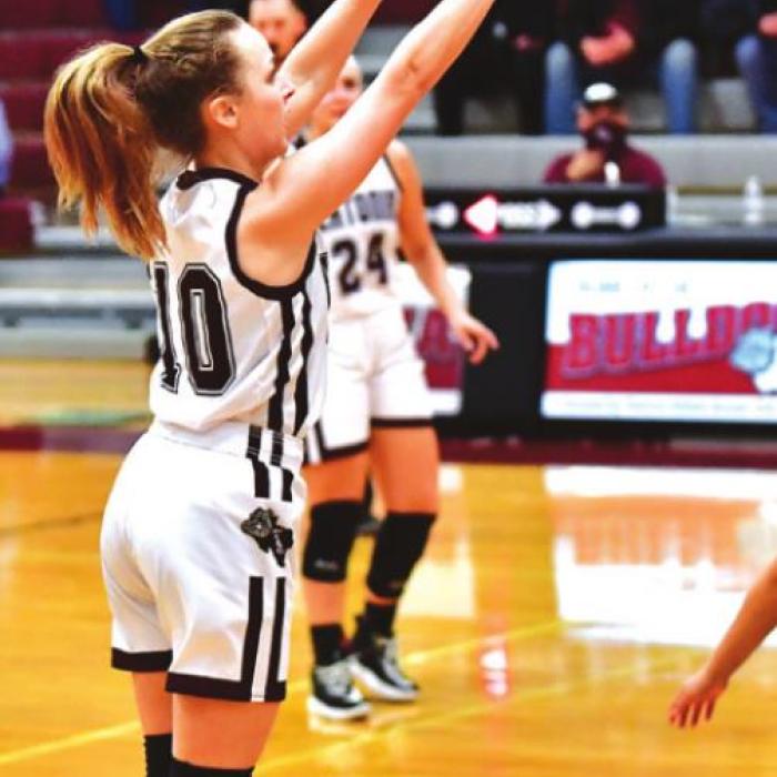 Flatonia’s Shannen Novak stays hot on 3 point shots Friday night in Flatonia against Louise. Photo by Stephanie Steinhauser