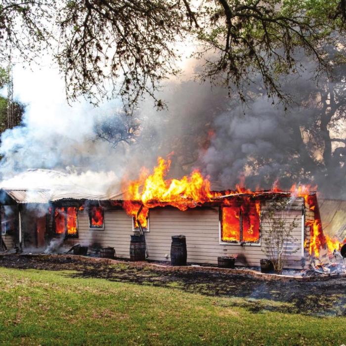 La Grange and Flatonia firefighters battled a house fire on FM 609 Monday afternoon. No one was injured, but three pets were missing following the blaze. Photos by Andy Behlen