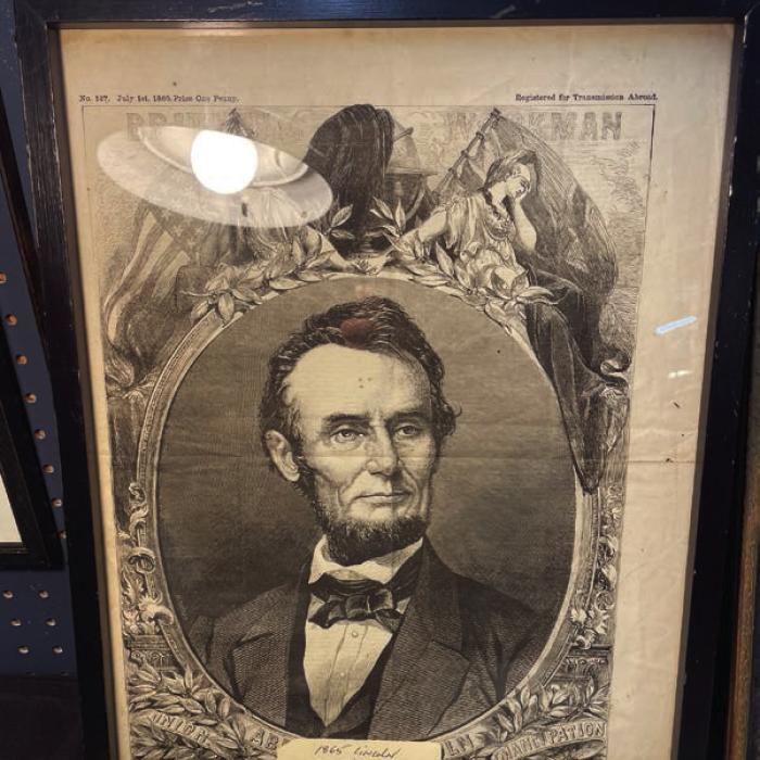 A portrait of Abraham Lincoln from an 1865 broadsheet newspaper.