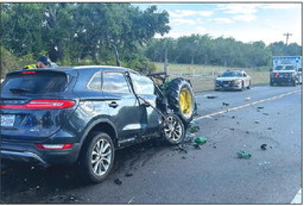 This is a photo of the accident scene after the car and tractor collided Wednesday on FM 609. Fayette County Sheriff’s Dept. photo