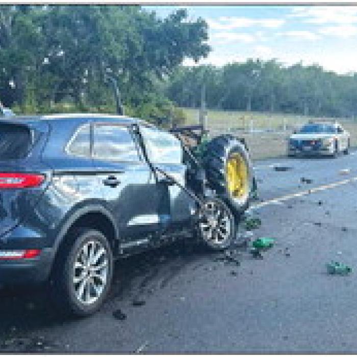 This is a photo of the accident scene after the car and tractor collided Wednesday on FM 609. Fayette County Sheriff’s Dept. photo