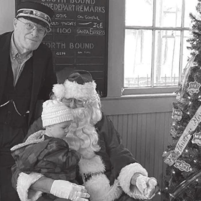 A self-proclaimed train nut, Arnold looks forward to Santa’s annual December arrival aboard a full-size Union Pacific locomotive at the La Grange Railroad Depot Museum. Inside, Santa meets with local boys and girls.