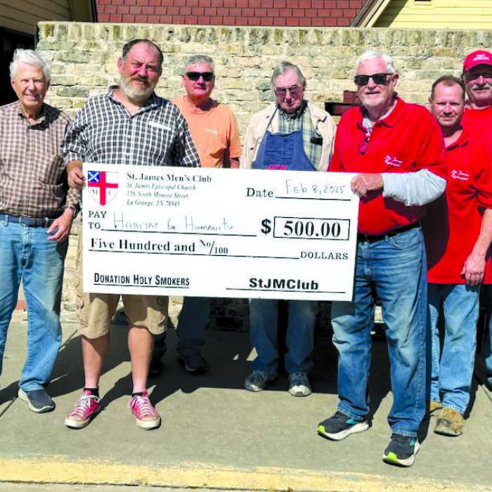 The St. James Men’s Club - Holy Smokers cooked for Fayette County Habitat for Humanity on Saturday, Feb. 15. Pictured from left are Dan Boyles, Kenny Couch (Executive Director of Habitat), Jimmy Klyng, Paul Crane, Joe Bailey, Jason Krupala, and Larry Kahanek.