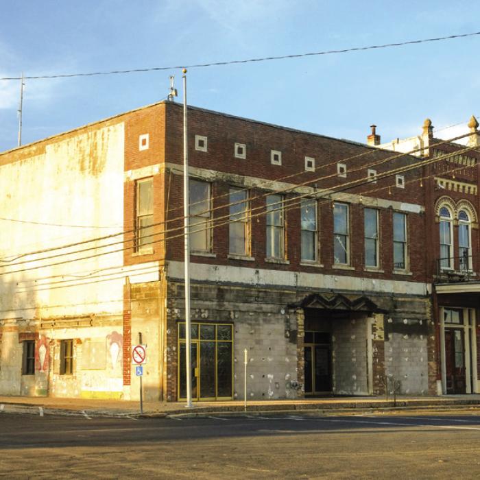 The former Schulenburg City Hall at the corner North Main St. and Upton Ave. has sat vacant since major structural issues were discovered earlier this year. The City initially tried renovating the building but then shifted gears in favor of building a new municipal complex to house both City Hall and the police station. Last Monday night, after facing some public pressure, the City Council voted to refocus efforts on restoring the downtown building. Photo by Andy Behlen
