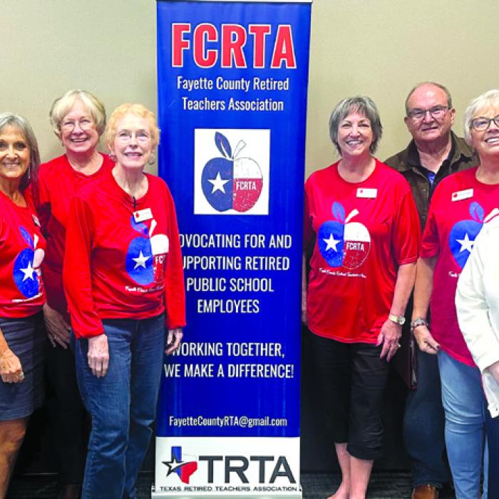 Pictured front from left: Lisa Slinkard, Melanie Mica, Karen Fitch, and Joan Miertschin; back row: Rick West, Carolyn West, Chris Morrison, Kathy Schatte, Bill Wagner, Terri Wagner, and Peggy Halamicek.