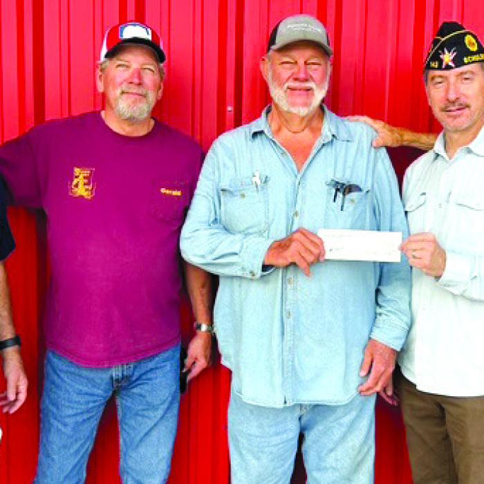 Schulenburg Hermann Sons Donate To Flags on Graves Prior To Memorial Day