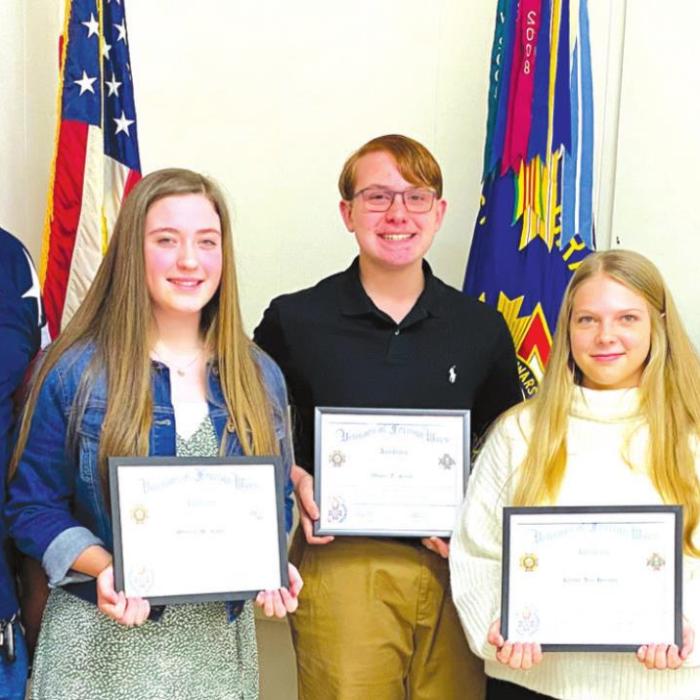 La Grange VFW and Auxiliary Voice of Democracy Winners from left: VFW and Auxiliary Contest Chairmen Mary and Richard Gray, first place winner Madelyn M. Kates, second place winner Westin T. Smith, and third place: Kaylee Ann Hensley, VFW Auxiliary Secretary Marilyn Kothmann, and VFW Commander Andy Kruppa.