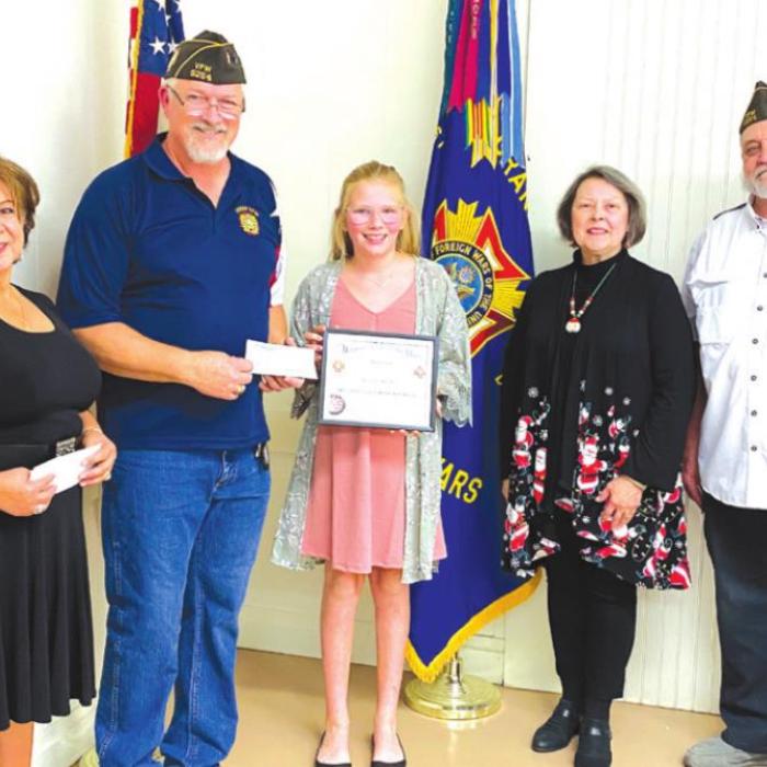 La Grange VFW and Auxiliary Patriot’s Pen winner from left: VFW and Auxiliary Contest Chairmen Mary and Richard Gray, first place winner Ashtyn G. Schaefer, VFW Auxiliary Secretary Marilyn Kothmann, and VFW Commander Andy Kruppa.