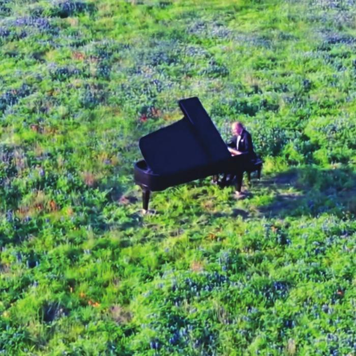 Since the pandemic started, Round Top Festival Institute has been reinventing itself via online, YouTube and video performances. It all started this past March with a concert piano in a bluebonnet field by James Dick, Round Top Festival Institute Founder. Photo by Don Teague