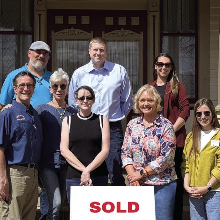 Top (Left to Right): Kenny Couch (Habitat for Humanity), Mark Rothbauer (new homeowner), Susannah Mikulin (Greater Fayette Community Foundation); Bottom (Left to Right): Michael and Lisa Corker (Broker/Owners, Hart Land Real Estate), Jennifer Rothbauer (new homeowner), Paula Collins (Buyers’ Agent, Hart Land Real Estate), Ashleigh Parks (Greater Fayette Community Foundation).