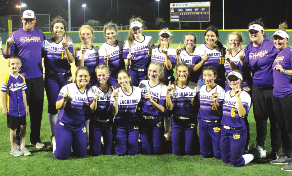 The members of the La Grange softball team show off who is No. 1 after beating Smithville 2-1 Tuesday at home to clinch the District 20-4A title. Photo by Jeff Wick