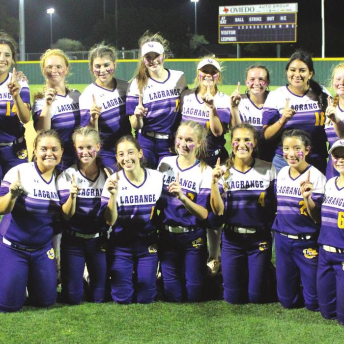 The members of the La Grange softball team show off who is No. 1 after beating Smithville 2-1 Tuesday at home to clinch the District 20-4A title. Photo by Jeff Wick