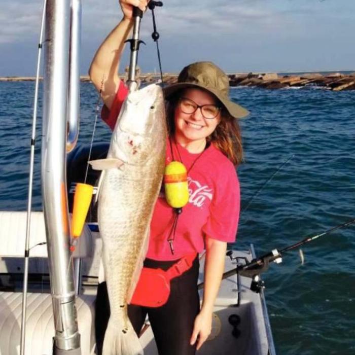 Ron and Pam Knotts’s granddaughter Keylee with her Redfish that she caught on her first saltwater fishing trip with Pops, Ron Knotts.