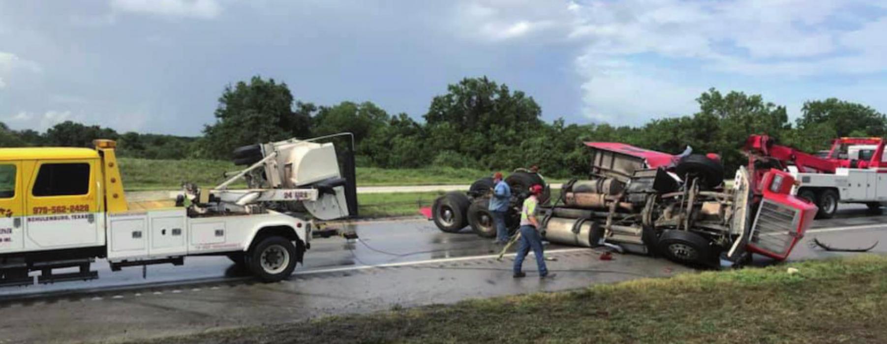 An 18-wheeler hydroplaned and rolled over on Interstate 10 east of Schulenburg Tuesday afternoon, blocking eastbound traffic for nearly two hours.