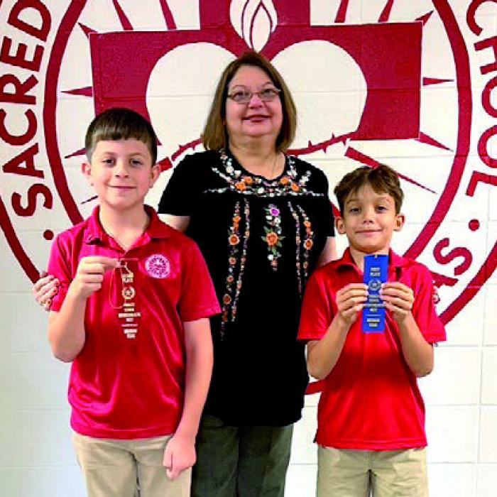 Spelling: 3rd Grade, Justin Janda-1st, Mattison Bronson-2nd; Coach: Ms. Sabina Rotter.
