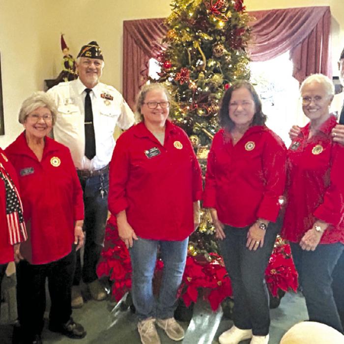 American Legion Auxiliary came to recognize all of our veterans and the spouses of veterans. They spent time telling stories, singing songs and ended the visit with handing out goodie bags loaded with holiday treats. Pictured left to right: Gladys Polasek, Secretary/ Treasurer Stacy Ryza, Commander Richard Gray, Vice President Phyllis Chavarria, Elaine Matthys, President Mary Battle, and Service Officer John Battle.