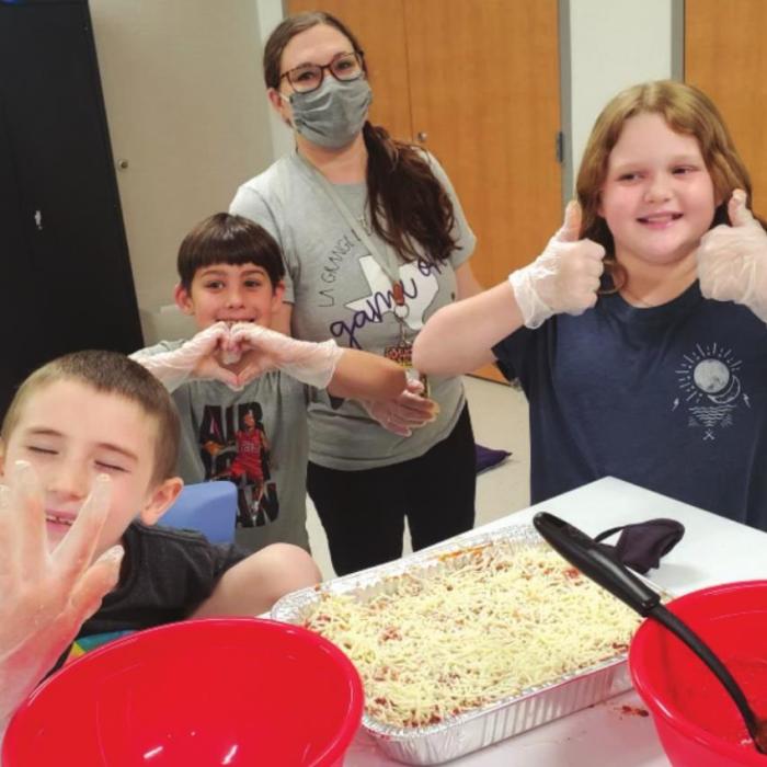 La Grange elementary students showed off their baking skills last week, making lasagna for volunteers and military members working at Friday’s vaccine event at The Fayette County Fairgrounds. Photos courtesy of Lauren Almanza