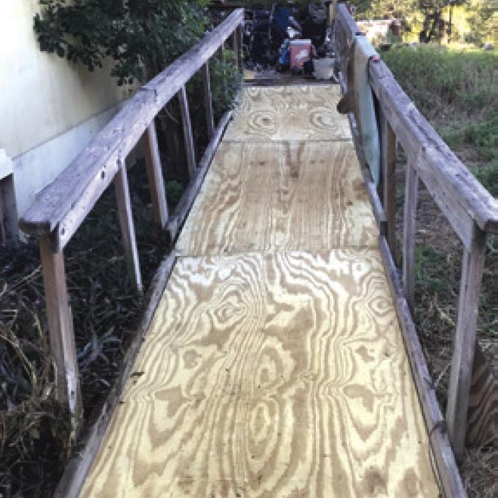 On Sept. 22, Fayette County Texas Ramp Project volunteers repaired an existing 23ft. wheelchair ramp and porch on Rocky Acres Rd. north of La Grange.