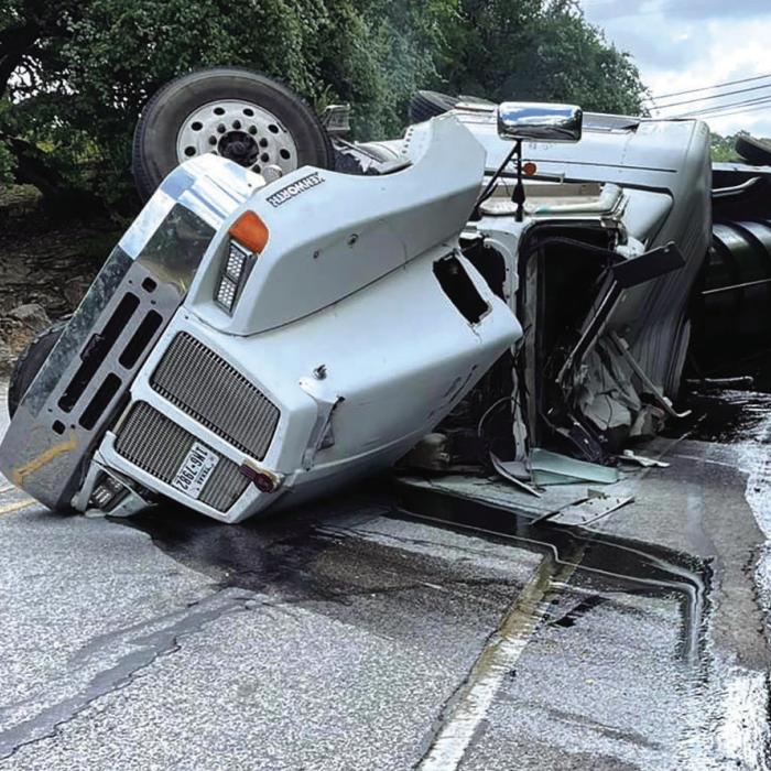 Hazardous Spill on Bluff After Truck Flips