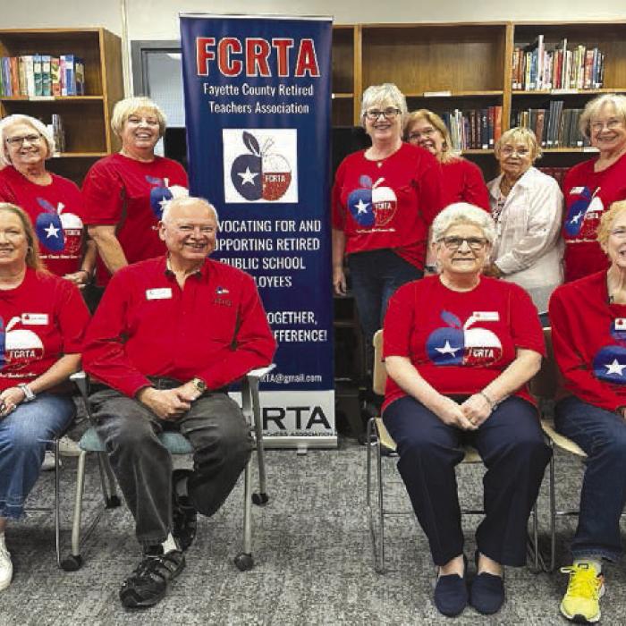 Pictured front from left: Marge Shofner, Lisa Slinkard, Joe Ramirez, Joan Miertschin, Karen Fitch, Kim Joost; back row: Mary K. Seifert, Kathleen Svatek, Sandra Holub, Theresa Wagner, Peggy Halamicek, Esther Hartman, Patty Reid, Chris Morrison, Carolyn West, Donna Burton, Rick West. Not pictured is Marceil Prestridge.