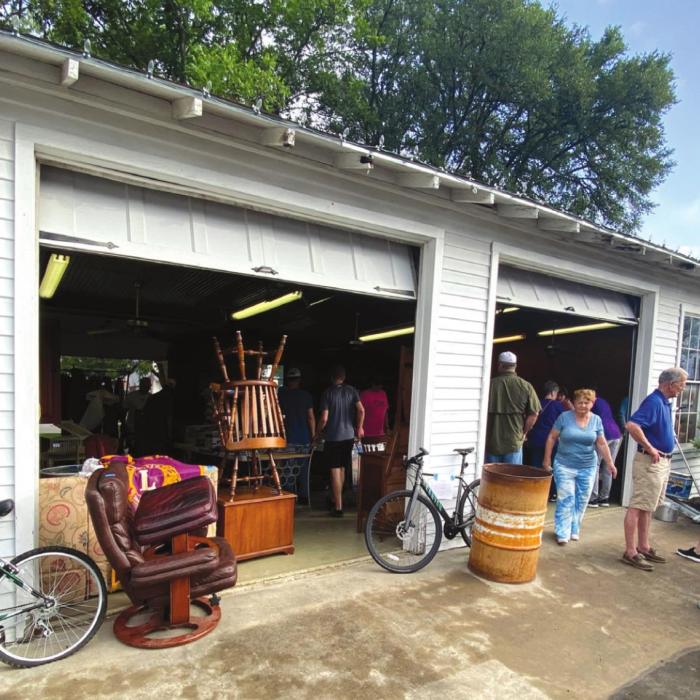 The Lions Club members have filled the Old Fire Station on the Square with many interesting bargains being sold to sponsor local scholarships