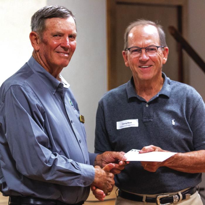The Flatonia Area Food Pantry received a $5,000 grant from FEC and CoBank. Pictured above is Director of Development Larry Haas and FEC Board President David Lehmann.