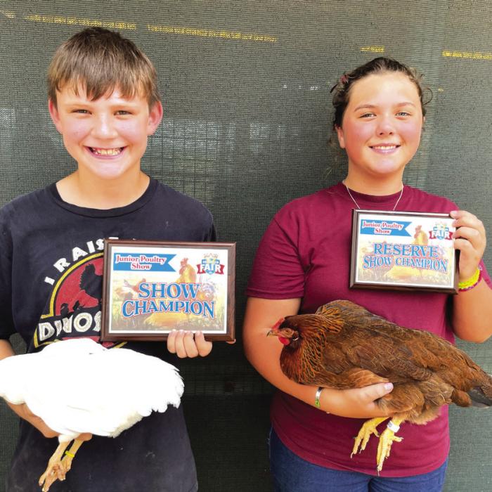 POULTRY SHOW • JUNIOR POULTRY from left, Keoni Brummond, grand; and Caleigh Klecka, reserve