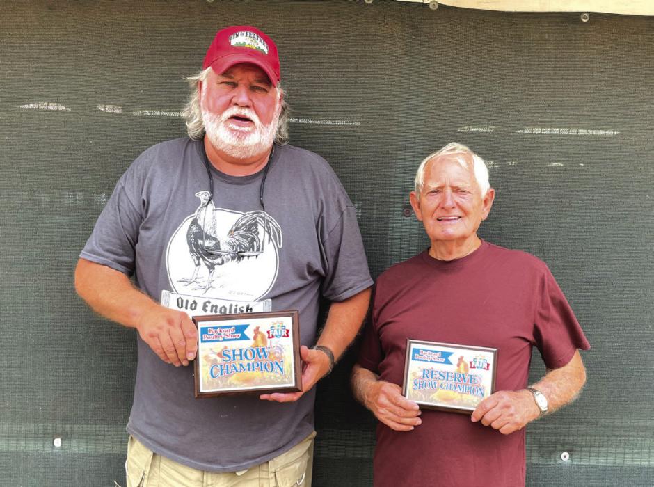 POULTRY SHOW • BACKYARD POULTRY from left, Bob Choate, grand; and Dan Dykes, reserve