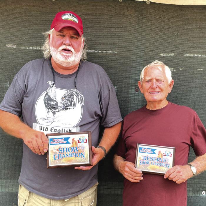 POULTRY SHOW • BACKYARD POULTRY from left, Bob Choate, grand; and Dan Dykes, reserve