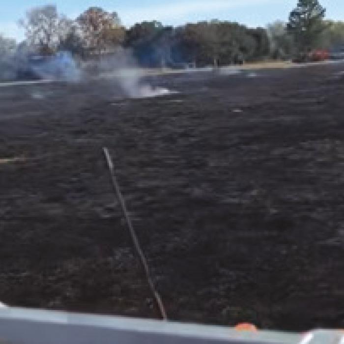 The scene from the back of a fire truck shows the extent of the grass fire. Photo courtesy of the Carmine Volunteer Fire Department