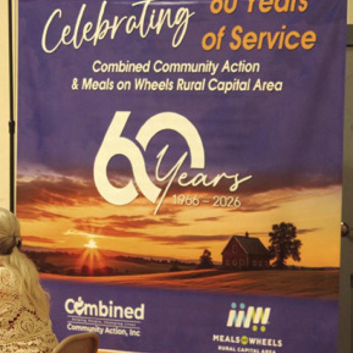 A banner at Thursday’s lunch.
