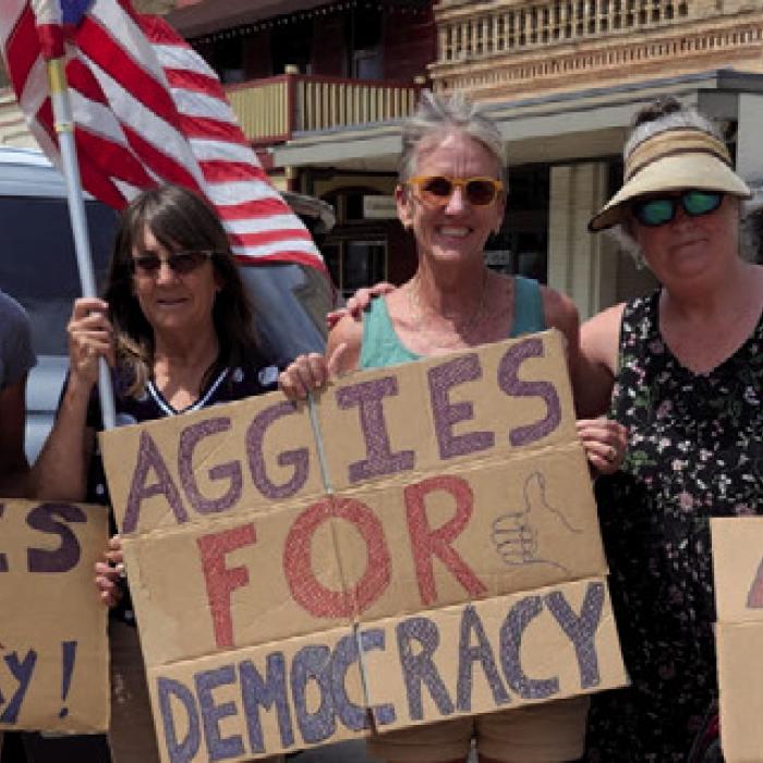 “Aggies for democracy rallied on the La Grange Square on Sunday. The next rally changes from Sunday to Saturday, May 24, and the new time is 10 am. What has not changed is the place, southwest corner of the La Grange Square. All patriotic Americans for democracy are welcome.” Photo Courtesy of Virginia Leech