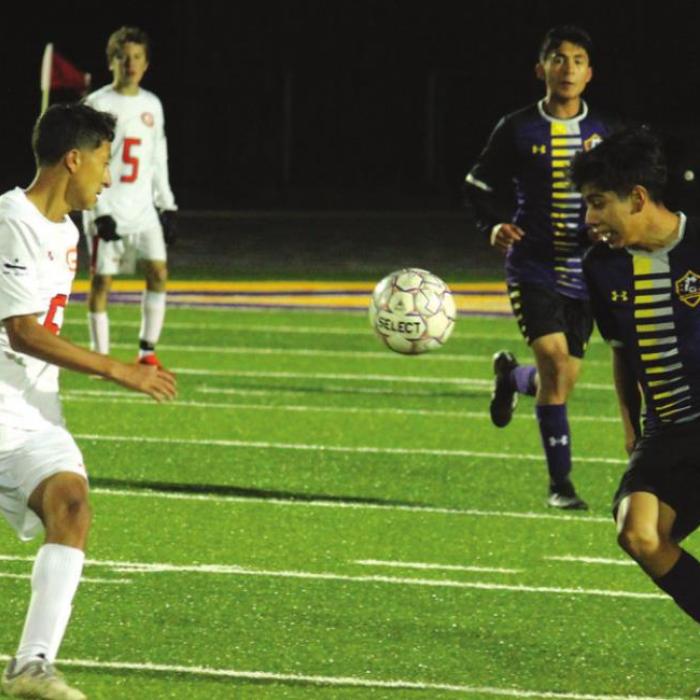 La Grange’s Jonathan Vazquez-Hernandez battles for control of the ball Tuesday. Photo by Jeff Wick