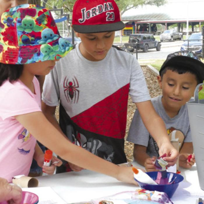 Local children enjoy Art in Schulenburg’s Wolters Park on May 6.