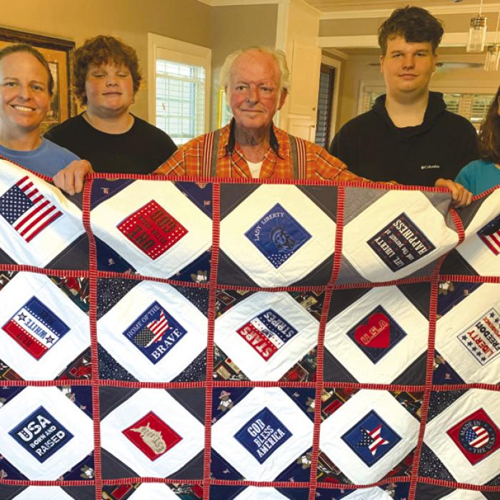 Dan Tajchman of La Grange was presented a Quilt of Valor by his wife Marian. Dan served as E5 US Army Intelligence from 1969-1972. He is surrounded by his daughters and grandsons. Marian is a member of the Colorado Valley Quilt Guild who made the quilt.