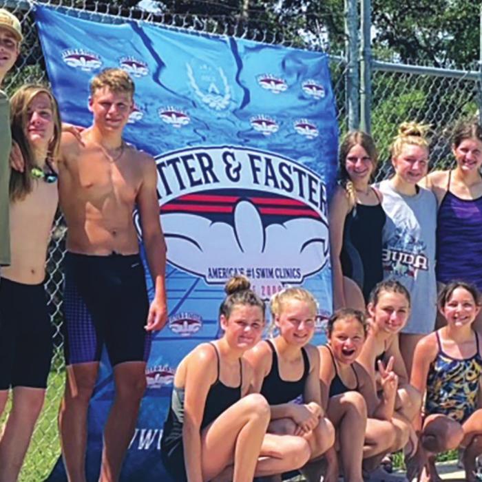Local Swimmers Learn from All-American