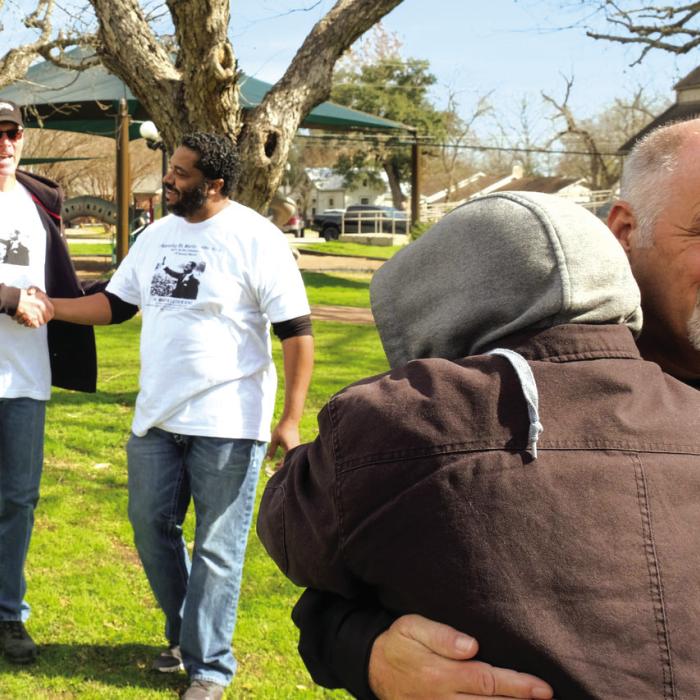 The fifth annual Unity and Community Walk will be held January 19 (MLK Day) beginning at 10 a.m. It starts on the grounds of the Fayette Public Library in La Grange and goes to the Fayette County Courthouse. In this file photo from last year, Jonathan Ellis, one of the organizers of the walk, asked attendees to introduce themselves to someone they had never met. Pictured are some of the new friends.