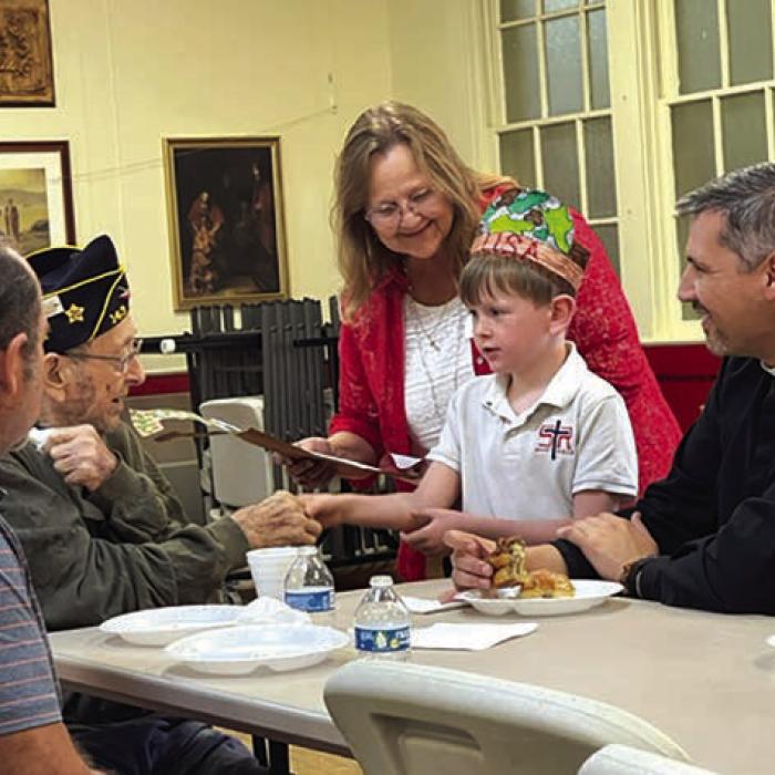 On Thursday, November 9, St. Rose of Lima Catholic School students and families celebrated our Veterans. The Liturgy was dedicated to all Veterans. Students prepared the liturgy, sang, and took part in a special Patriotic Prayer Service. Following mass, Veterans were invited to the cafeteria for home-baked goods with refreshments and more class presentations. Thank you to all of the men and women who have served and continue to serve our country.