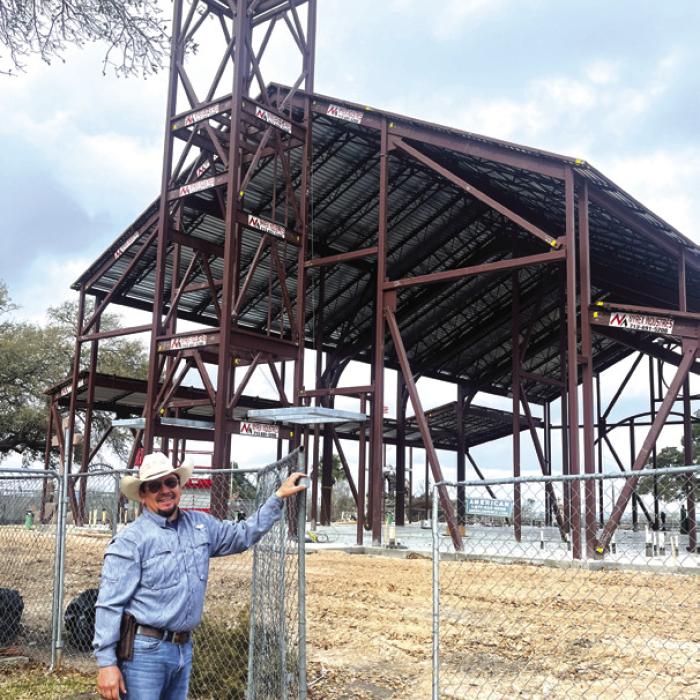 Miguel Rios opened the gate for us to tour the construction site of the new Hostyn church. Photo by Jeff Wick