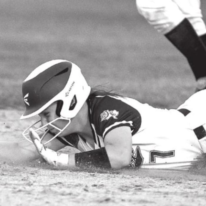 Flatonia’s Hannah Ellis dives in to second base before Schulenburg can lay down a tag. Photos by Stephanie Steinhauser