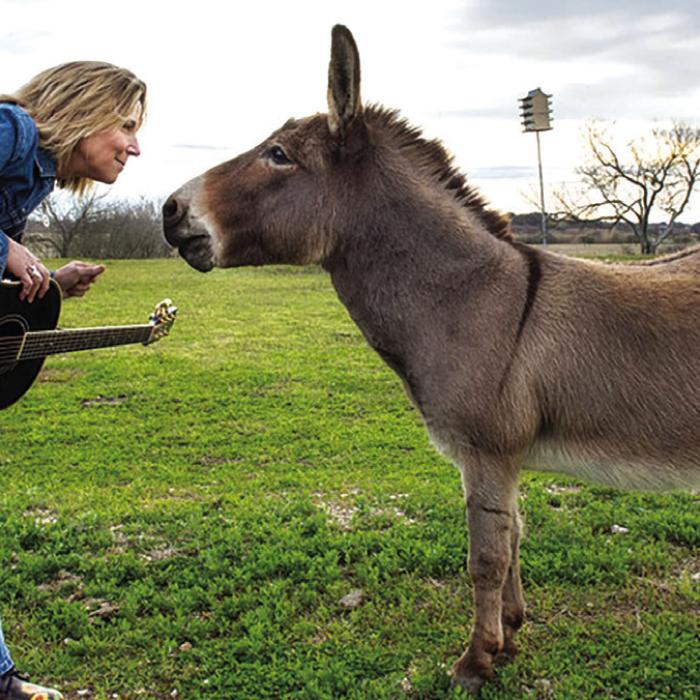 Musician Terri Hendrix ‘horsing’ around. She said she might even premiere a song or three Saturday in La Grange from a brand new record she’s been working on.