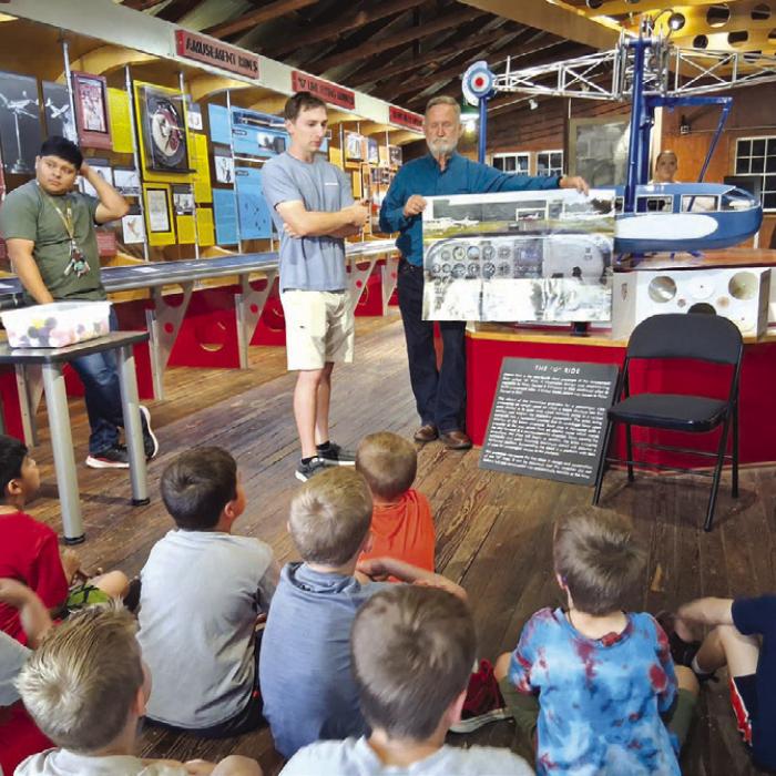 Professional pilots, Garrett Olive and Jimmy Jacobs teach Stanzel Co-Pilots all about the aviation sic pack – six gauges that help a pilot prepare to take off and to maintain safety in flight.