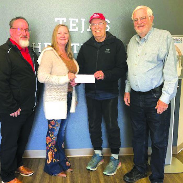The Holy Smokers, the Men’s Club of St. James Episcopal Church of La Grange, made a special year end donation of $1,000 to Tejas Healthcare of La Grange. Pictured from left is: Gene Carson, Tejas CFO, Sheri Kehler, Tejas CEO, Dr. Bill Bailey, Tejas Director and Holy Smoker Joe Bailey.