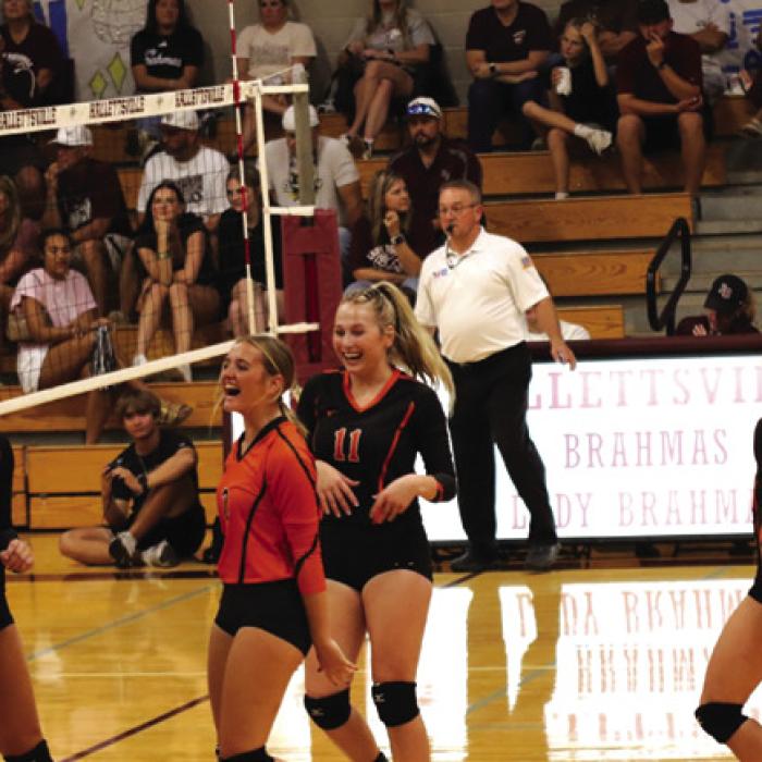 The members of the Schulenburg volleyball team celebrate a point during Tuesday’s victory. Photo by Audrey Kristynik