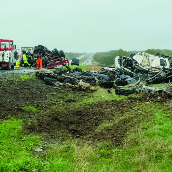 Truck Carrying Crushed Vehicles Wrecks on I-10
