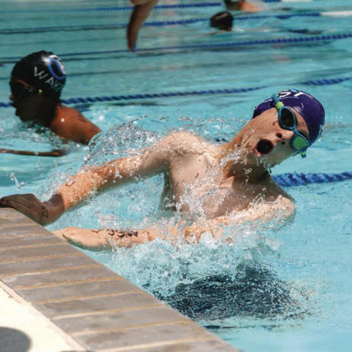 Will Janda on the final turn of the Individual Medley. Photo by Brittany Dawson